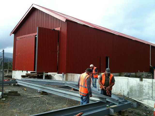 Portal halves delivered to Maymorn on 11 April. Workshop foundations can be seen to the right of the photo. Photo: Glenn Fitzgerald.