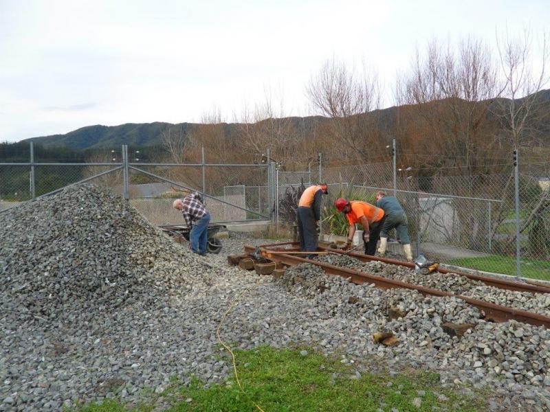 Another view of work in progress, fastening rail down to sleepers and ballasting. Photo:Glenn Fitzgerald.