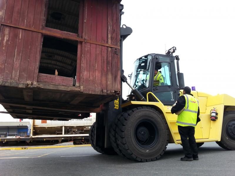 KiwiRail forklift transferring one of the two carriage bodies