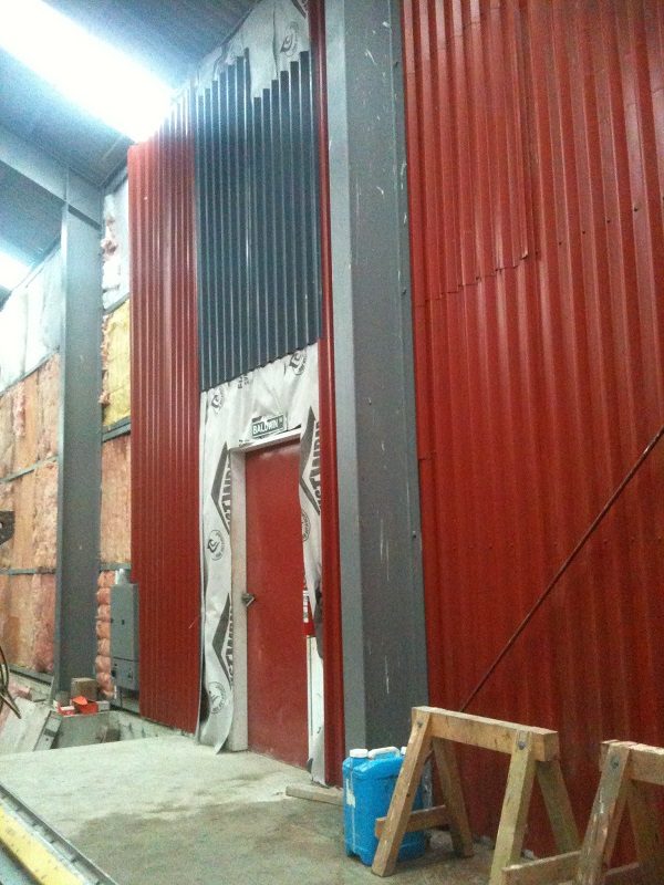 A start was made on cladding the internal wall between workshop and main shed in January 2016.