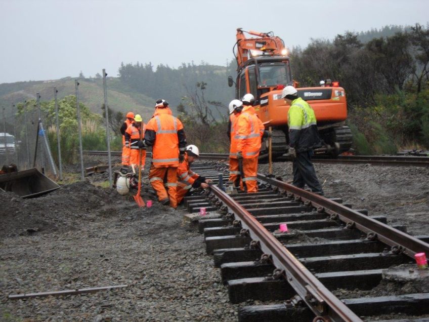 Rails and sleepers extending out through fence towards mainline. Photo: Glenn Fitzgerald