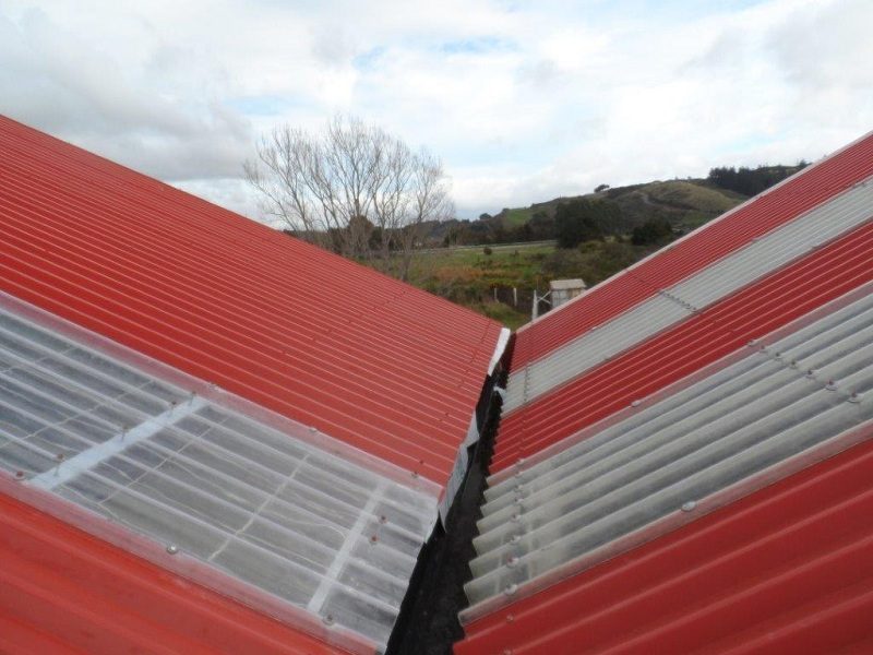 Workshop roof cladding (left), installed 14 - 15 June. A few fastenings yet to be added...