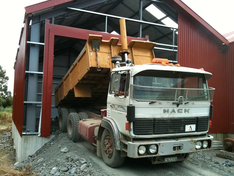 And dumped into the workshop foundations through the train door frame