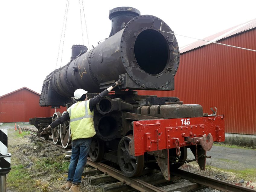 Hugh positioning smokebox end of boiler onto the saddle